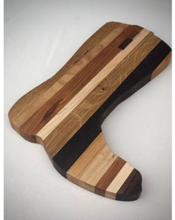 Wooden serving board in the shape of a cowgirl boot