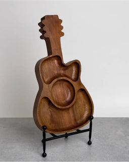 Wooden server tray in the shape of a guitar, measuring 17" x 9" x 1.5", perfect for serving food or as a decorative centerpiece for music lovers.