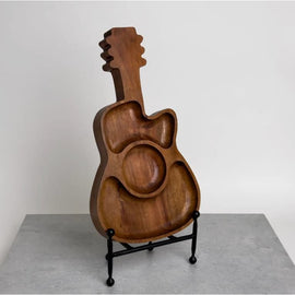 Wooden server tray in the shape of a guitar, measuring 17" x 9" x 1.5", perfect for serving food or as a decorative centerpiece for music lovers.