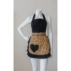 Leopard print apron with black heart pocket and ruffled trim displayed on mannequin