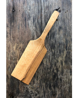 Hand-carved wooden Long John Flipper with a long handle and curved edge, ideal for flipping pancakes or veggies without scratching cookware.