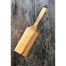 Hand-carved wooden Long John Flipper with a long handle and curved edge, ideal for flipping pancakes or veggies without scratching cookware.