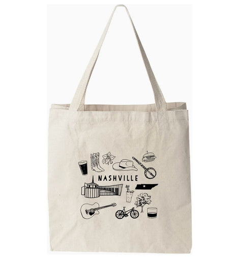 Natural cotton canvas tote bag with “Nashville” printed on the front, featuring sturdy handles and a roomy interior