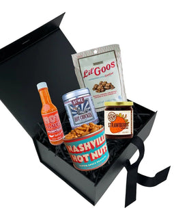 Taste of Nashville gift box featuring hot sauce, Nashville hot peanuts, hot chicken seasoning, strawberry jam, and chocolate peanut clusters