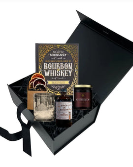 Honky Tonk Old Fashioned cocktail gift kit with Nashville skyline whiskey glass, cocktail syrup, cherries, dried citrus, and bourbon mixology book