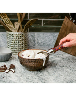 ice cream scoop with stainless steel head and layered rainbow Pakka wood handle, perfect for stylish dessert serving.