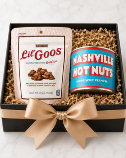 Gift box with 'Lil' Goos' and 'Nashville Hot Nuts' packaging on a white background