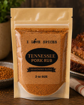 Package of I Love Spices Tennessee Pork Rub on a wooden surface with pork ribs and spices.