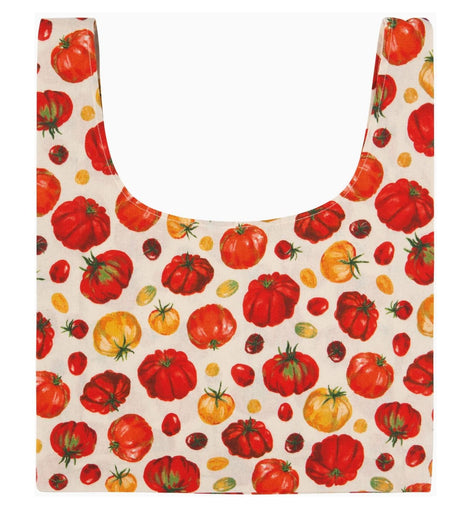 Reusable grocery bag with heirloom tomato print in red, yellow, and green, featuring wide handles and flat base, made from 100% cotton.